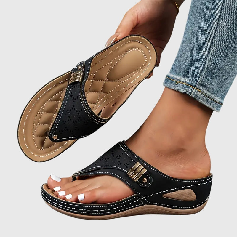 Xanthippe | Women's Toe Loop Laser Cut Wedge Sandals - Black - Image 1